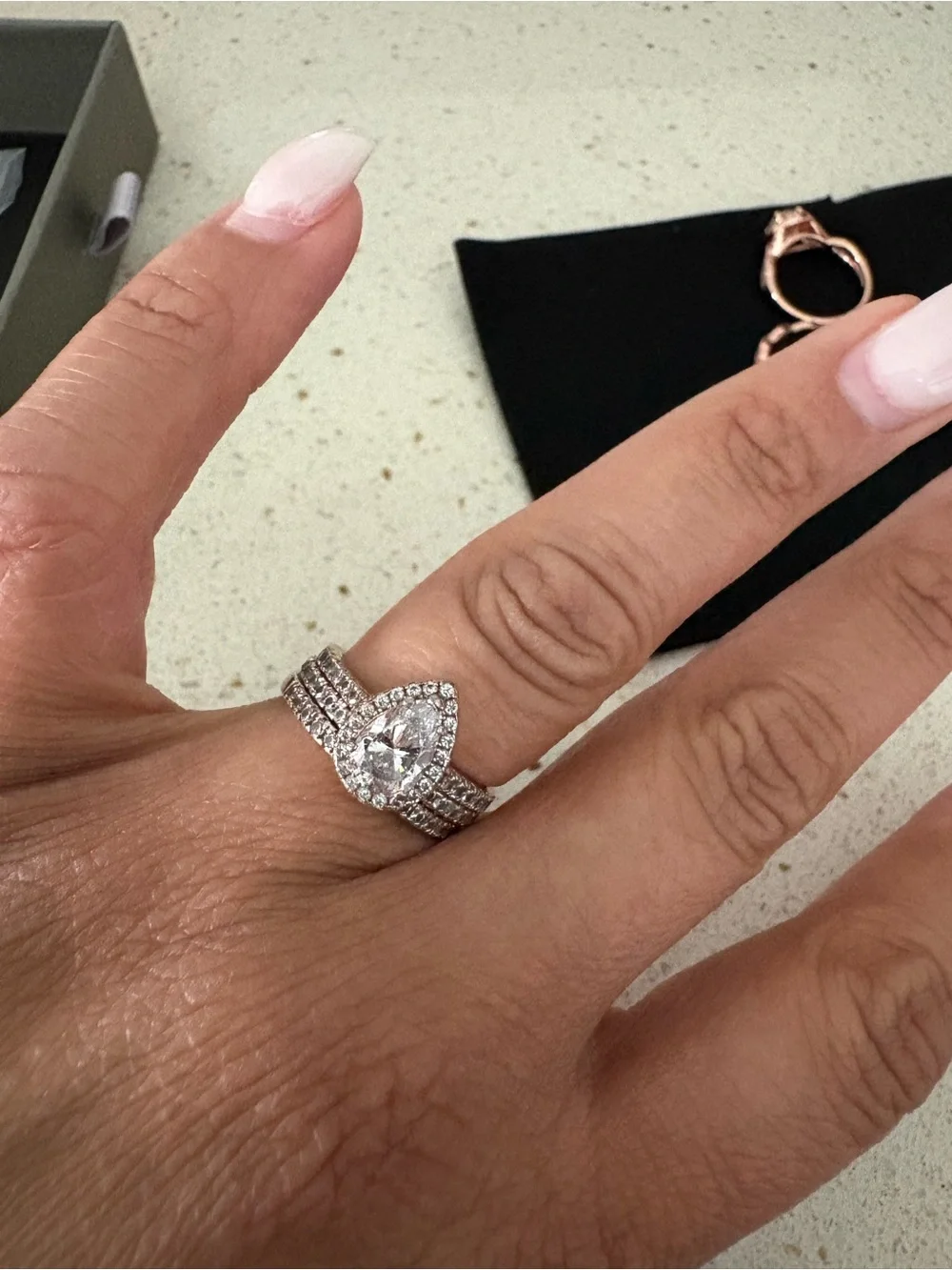 Pear-Shaped Halo Ring with Clear Cubic Stones in Silver